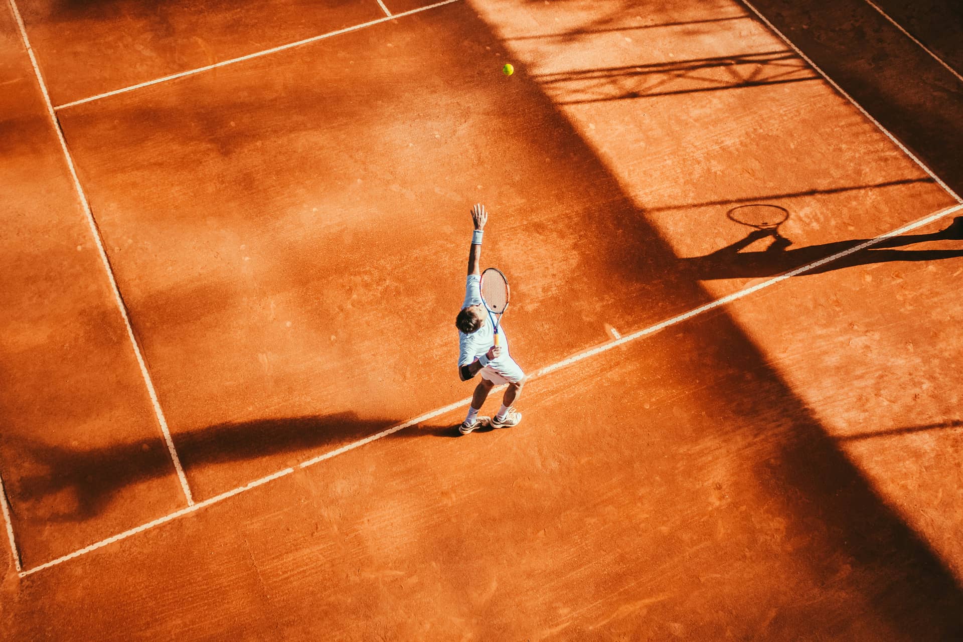 Private tennis court at a luxury countryside group property