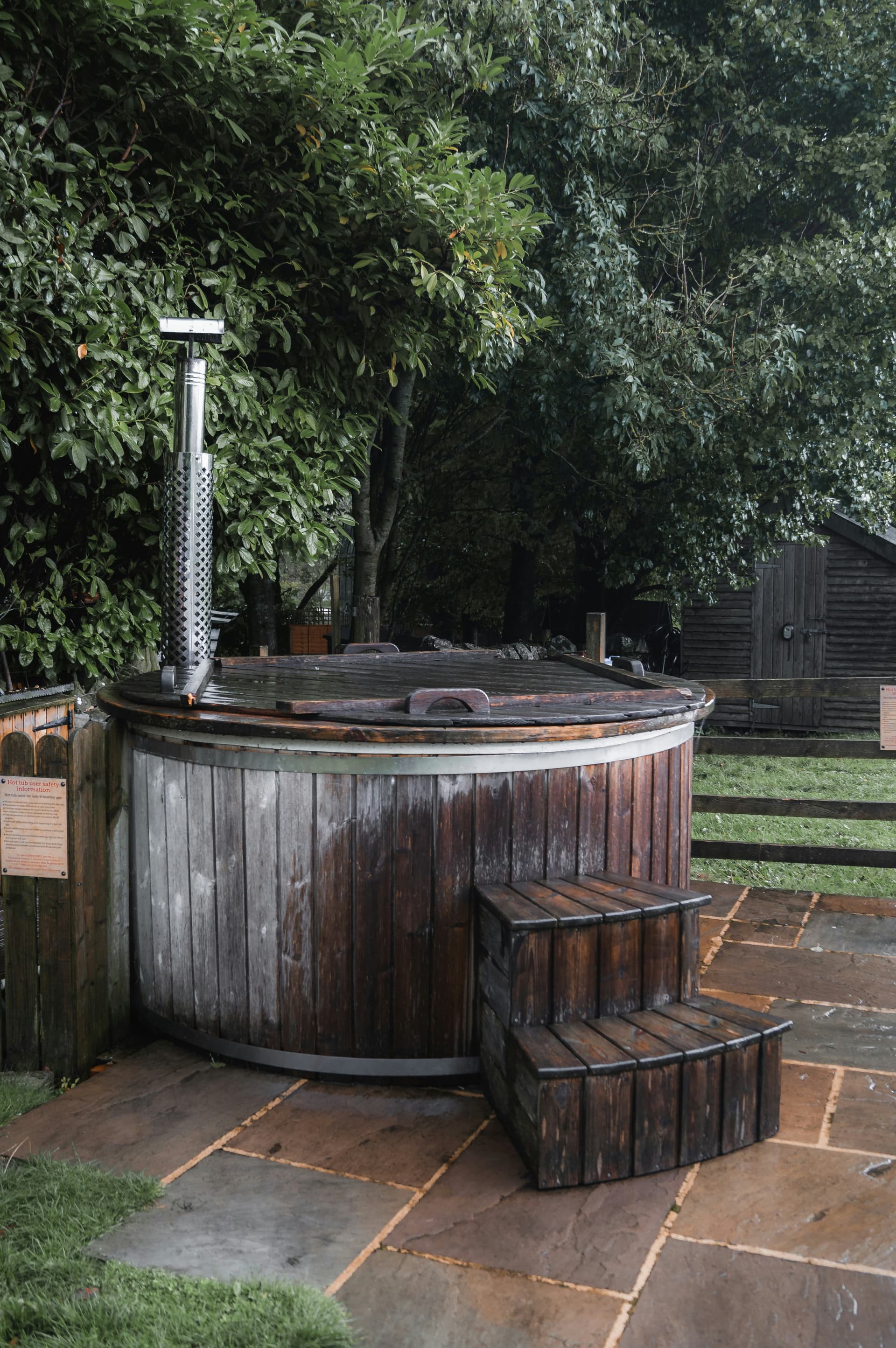 Wood-fired hot tub in a garden