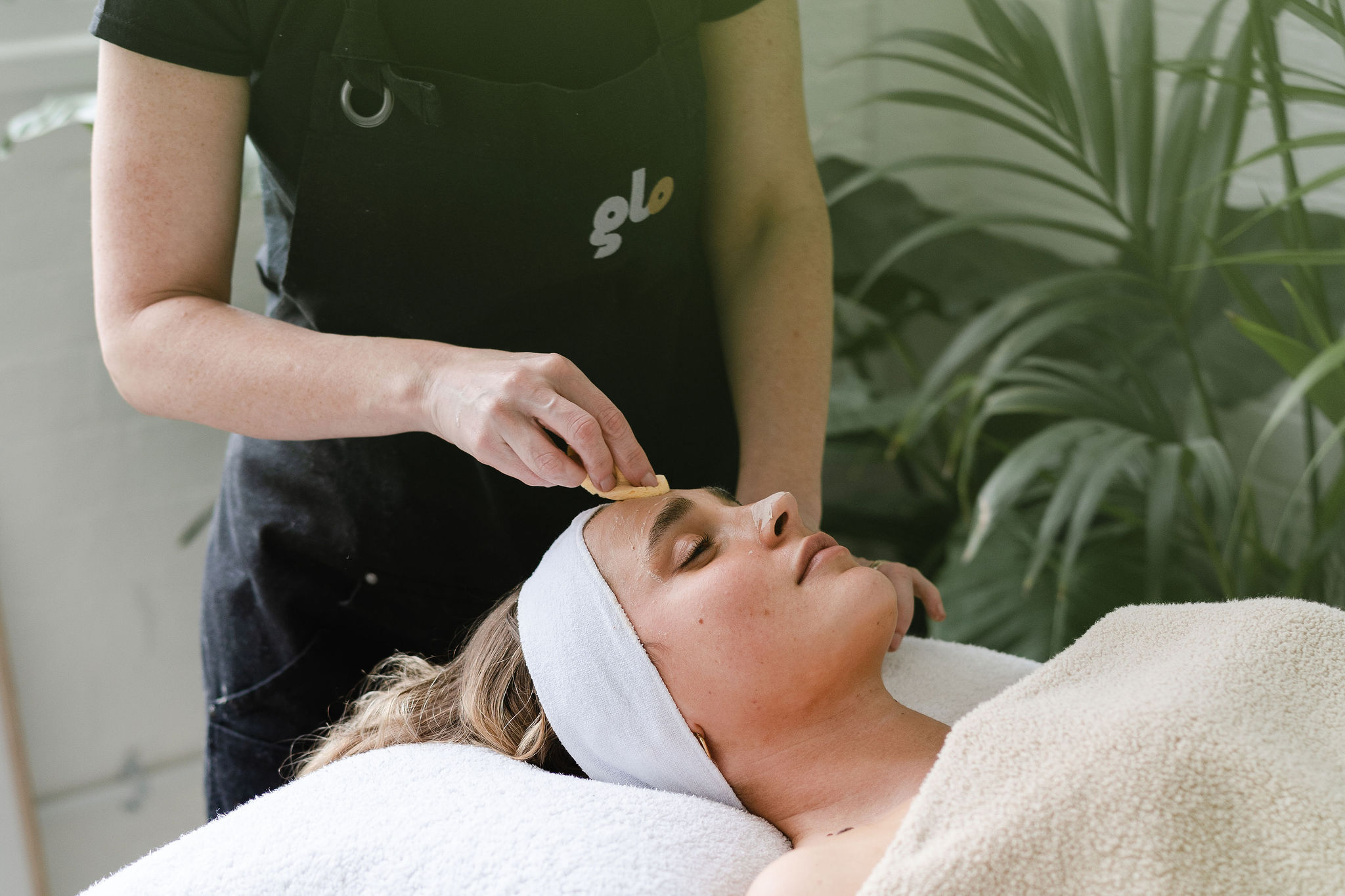 Mobile spa therapists setting up for a hen party group treatment